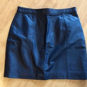 Girl’s mini leather skirt